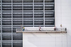 Workers working on a steel construction building